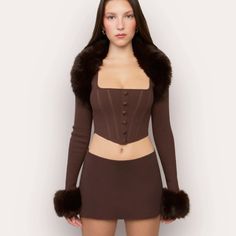 Danielle Guizio Faux Fur Knit Bolero Revolve Large Keep It Cozy With Our Faux Fur Knit Bolero. Designed To Coordinate With Our Knitted Corset, The Plush Faux Fur Trim Can Be Removed For A More Casual Finish, But We Love It For The Maximized Look. Long Sleeves Slip-On Style Detachable Faux Fur Trim At Collar And Cuffs Cropped 50% Viscose, 28% Polyester, 22% Nylon Questions? Leave A Comment Below! Knitted Corset, Knit Bolero, Long Sleeve Shrug, Faux Fur Top, Danielle Guizio, Fur Top, Chocolate Brown Colour, Shrug Cardigan, Shrug Sweater