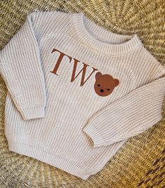 The perfect outfit for your little one's Beary First Birthday. Colors can be customized and can change the number (ex. ONE with bear for the O for a second birthday) to best fit your party theme and colors. They have an oversized fit and are perfect for all day wear, pictures, or even smash cakes.  I recommend hand washing and air drying if possible but can be laundered on delicate if needed. Second Birthday Outfit, Birthday Colors, Beary First Birthday, Birthday Sweater, Baby Jumpers, White Crew Neck T-shirt With Bear Print, Smash Cakes, Pullover Outfit, Embroidered Sweater