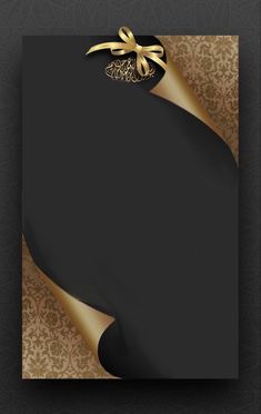 a black and gold card with a bow on it's side, in the middle of