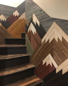 some stairs painted with different colors and designs