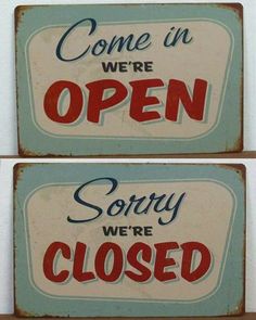 two signs that say sorry we're closed and come in open, sorry we're closed