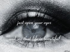 an eye with the words just open your eyes and see that life is beautiful