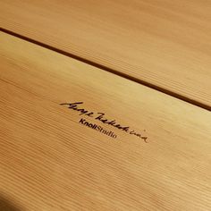 a wooden table with writing on it that says ame rabana kohlstito