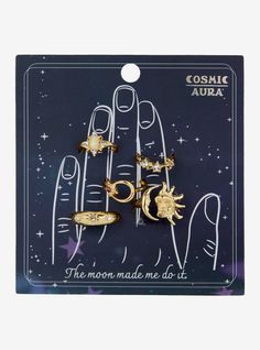 Channel the cosmos with this gold-tone stacking ring set! Featuring celestial sun  moon and star designs with sparkly gem detailing.Size 4  6 & 7Nickel-free alloy; acrylicSet of 5Imported Cosmic Aura, Sakura Art, Celestial Sun, Lampoon's Christmas Vacation, Acrylic Set, Blue Beetle, Halloween Horror Nights, Stacking Ring Set, Moon And Star