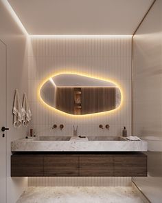 a bathroom with two sinks and a large mirror on the wall next to each other