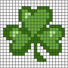 an image of a cross stitch shamrock