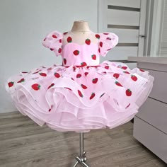 Introducing our stunning Puffy Pink Flower Girl Dress, a perfect choice for your little princess's special day! This dress not only radiates charm with its shiny strawberry hue, but it also features an adorable strawberry baby dress design that is simply irresistible. Whether it's her 1st birthday celebration or any other special occasion, this dress will make her feel like the belle of the ball. The puffy tulle skirt adds a touch of whimsy, while the soft and comfortable fabric ensures she can twirl and dance all day long. Make her shine brighter than ever in our puffy pink flower girl dress! If you have questions, I will be happy to answer them. I will do my best to make you satisfied with your purchase from my store. Strawberry Shortcake Dress For Baby, Strawberry Shortcake Birthday Outfit, Strawberry Baby Dress, Strawberry 1st Birthday Party Theme, Strawberry Shortcake 1st Birthday Party, Strawberry 1st Birthday, Sweet Baby Shower Ideas, Puffy Tulle Skirt, Berry Birthday