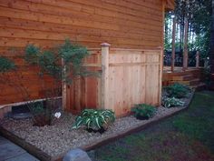 an outside view of a house with wood siding