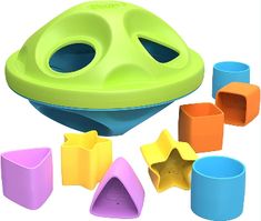 various shapes and sizes of plastic toys on a white background