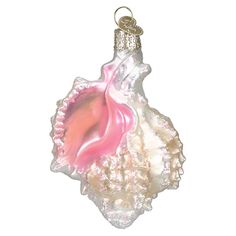 a pink and white shell ornament hanging from a chain on a white background