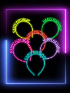 a neon sign with the words happy birthday written on it in different colors and shapes