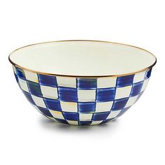 a blue and white checkered bowl with gold rim