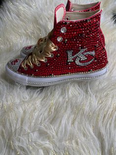 Custom Bling Converse All Star Chuck Taylor Sneakers. All designs handmade and embellished with a variety of high-quality crystals. Good for weddings, proms, homecomings, birthdays, special events or just your everyday girly girl. Shoe Details: Chiefs Converse, KC Chiefs Inspired Custom Converse Red Converse All Star Chuck Taylor Sneaker (Cloth material style) Shoe Size: starting at women's size 5 to women's size 12; Size availability may vary based on our supplier's current inventory. If your s Boujee Shoes, Blinged Shoes, Bedazzled Sneakers, Junk Socks, Kids Converse Shoes, Chucks Shoes, Rhinestone Converse, Bedazzled Shoes Diy, Bling Sneakers