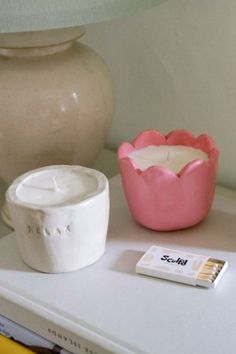 a candle and some other items on a table