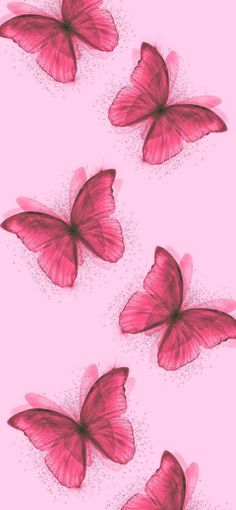 three pink butterflies flying in the air on a pink background with tiny speckles