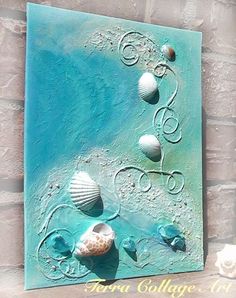 an art piece with shells on it and the words seashells painted on it