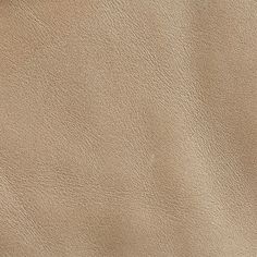 the texture of a tan leather background