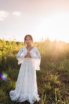 "THE OPHELIA MAXI DRESS The Ophelia is a vintage inspired bohemian maxi dress crafted from soft, floral lace for your tween, toddler, or little girl. In classic and timeless white, it's befitting as a flower girl dress, junior bridesmaid dress, first communion dress, or baptism dress. It's so comfortable and twirly your girl won't want to take it off. DETAILS ♥ Soft floral lace ♥ Polyester lining ♥ Elasticized waist SIZE GUIDE Please refer to the measurements below as a sizing guide. We recommen Long Sleeve Lace Baptism Dress, White Lace Long Sleeve Baptism Dress, First Communion Dress With Lace And Ruffles, White Lace Baptism Dress With Ruffles, Girls High Low Dress, Elegant Off-white Lace Baptism Dress, Girls Baptism Dress, White Lace Maxi, Rustic Flower Girls