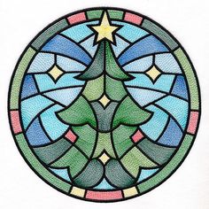 a circular stained glass window with a christmas tree in the center and stars on it