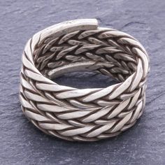 Thailand's Pakaon Sojintarit crafts a subtle statement piece for everyday wear in this classic ring. The artisan crafts a thick band from oxidized sterling silver using a woven motif that adds an intriguing textural element to the deceptively simple ring. Art Necklaces, Simple Ring, Craft Jewelry, Sterling Silver Rings Bands, Silver Choker, Themed Jewelry, Silver Band Ring, Classic Ring, Silver Cuff Bracelet