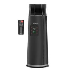 an electric fan heater with thermometer on it's side and remote control