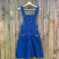 Vintage 1970’s Denim Midi Pinafore With Cute Pockets. No Tags. Measures 26” Waist. Vintage Denim Blue Denim Dress With Pockets, Vintage Denim Blue Overalls, Vintage Blue Denim Dress With Pockets, Vintage Medium Wash Overalls, Blue Fitted Vintage Denim Jumpsuit, Vintage Denim Dress With Pockets, Vintage Fitted Overalls In Medium Wash, Vintage Fitted Medium Wash Overalls, Vintage Denim Overalls In Medium Wash