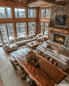 a living room filled with lots of furniture and a fire place in the middle of it