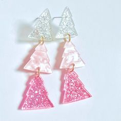 New Pinkmas Glitter Christmas Tree Earrings - Acrylic Post Earring Approximately 0.75” X 2.25” Dangly Post Back Acrylic Pierced Earring Perfect Pinkmas / Pink Christmas, Barbie Glam Holiday Earrings Boutique Item Comes Brand New In Sealed Plastic Acrylic Cut Earrings, Resin Dangle Earrings, White Jewelry For Holiday Party, White Holiday Party Jewelry, White Earrings For Festive Holiday Season, Pink Christmas Polymer Clay Earrings, White Christmas Festive Earrings, White Holiday Earrings, White Festive Christmas Earrings