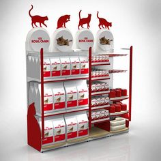 a red and white display case with cats on it's shelves, which are filled with cat food