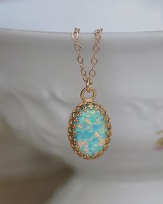 "A stunning necklace made using my new favorite color opal! These opals are a minty seafoam green color that reflects so many colors with every turn of the wrist! Opal is hand-set into a premium 14K gold plated setting and hangs from 14K gold filled chain. The chain is dainty, yet strong. Opal measures 1/2\" tall (14mm) not including the loop for hanging. Please choose desired chain length at checkout. * ALSO AVAILABLE IN STERLING - Please choose desired metal finish at checkout. * SEE MATCHING Italian Minimalism, Opal Necklace Gold, Pearl Necklace Designs, Jewelry Accessories Ideas, Dope Jewelry, Pretty Jewelry, Classy Jewelry, Drawing Inspo, October Birthstone