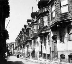 an old black and white photo of some buildings