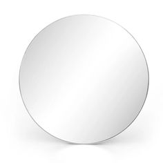 a round mirror on a white background