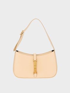 Our Cesia shoulder bag comes in a beige colourway that will slot in seamlessly with your pared-back neutrals. It features the recognisable gold-tone metallic accent across the body and is fitted with a convenient magnetic closure. Simply adjust the shoulder strap to find your desired drop. Charles And Keith, Chicago Summer, Eyewear Chain, Sitewide Sale, Beige Bag, Brand Collaboration, Gold Hand, Charles Keith, Gold Hands