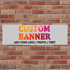 a sign on a brick wall that says custom banner add your logo / photo / text