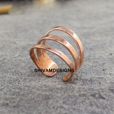 Pure Copper Wrap Ring ,  Finger Ring, Solid Copper Ring , Healing Copper Jewelry, Hammered Copper Ring ,Adjustable Ring, Toe Copper Ring, Product Detail:-  Metal: Solid Copper Ring Style : Healing Ring -: We use Pure Copper Jewelry The hammered copper ring is formed like an overlapping coil so that they can be slightly adjusted to fit. --------------------------------------------------------------------- Best Friend Gifts, Bestseller Bridesmaid Gift, Best Couple Gift Jewelry, gift for bride, dec Adjustable Metal Toe Rings As Gift, Adjustable Metal Toe Rings Ideal For Gifts, Adjustable Rose Gold Midi Rings, Minimalist Adjustable Copper Ring, Wire Jewelry Rings, Metalsmithing Jewelry, 1st Anniversary Gifts, Copper Ring, Wrap Ring