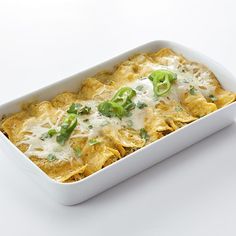 a casserole dish with green peppers and cheese