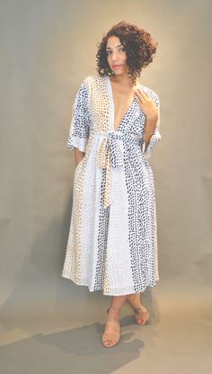 Recently released, the summery Vogue 9253 immediately caught my eye (and the eyes of a whole bunch of other sewists)! I love the sexy slit down the front of the dress paired with the fairly modest coverage everywhere else. With billow-y kimono style sleeves and a paneled skirt that gently flares out, ending at the shins, I knew it was right up my alley- a garment that allowed for a flash of skin without making me feel too naked. It's helmed as a 'Very Easy Vogue' pattern which I w... Vogue 9253, Wrap Dress Pattern, The Shins, Mode Abaya, Paneled Skirt, Maxi Dress Pattern, Vogue Pattern, Vogue Patterns, Kimono Style