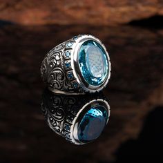 Material: 925 Sterling Silver Stone Type: Blue Topaz Ring Top Dimensions: 20 x 15 mm Average Weight: 27 gr. (depends on your ring size)  Shipping via DHL Express by The Grand Bazaar Istanbul. Delivery Takes 1-3 days to any worldwide location. Shipping is free of charge. FOR MORE HANDMADE JEWELRY VISIT: https://www.etsy.com/shop/GrandBazaarExclusive Masculine Design, Blue Topaz Gemstone, Blue Topaz Stone, Sky Blue Topaz, 925 Silver Ring, Healing Energy, Topaz Stone, Topaz Gemstone, 925 Silver Rings