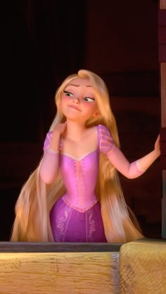 rappui from tangled in love looking out the window with her long blonde hair