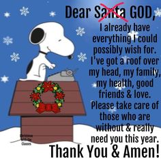 a snoopy dog is sitting on top of a box with a wreath in front of it