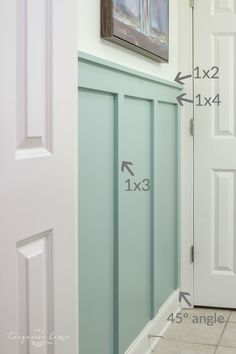 an image of a bathroom with measurements for the door