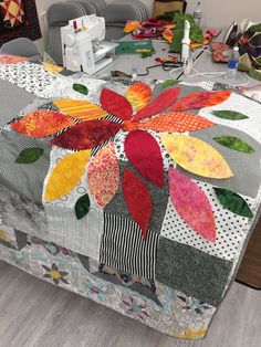 a quilted table topper on a dining room table