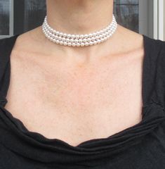 "Pearl Choker Necklace ~ This gorgeous necklace is made with Swarovski crystal pearls in your choice of white or cream. Makes a great choice of pearl bridal necklace or equally fitting for a day in the office or night on the town! Makes a great womens gifts! The three strand pearl necklace can be made with silver or gold finishings. It measures true choker length at 13\" to hug the neck and includes a lobster clasp closure with 2\" extender chain to get the perfect fit. In the last picture I sho Pearl Choker Wedding, Choker Pearl Necklace, Bridal Jewelry Pearl, Bridal Choker Necklace, Three Strand Pearl Necklace, Pearl Necklace Bridal, Choker Pearl, Womens Gifts, Pearl Necklace Choker