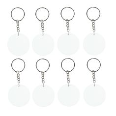 six round key chains with circular tags attached to each one, all in different shapes and sizes