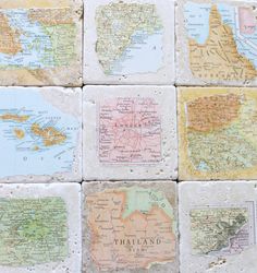 several different maps are arranged on some stone tiles with the word thailand printed on them