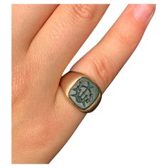 Classic Georgian style antique bloodstone intaglio and 9K rose gold signet ring. Late 19th Century The bloodstone intaglio of interconnected symbols and the letter W or M, depending on how you choose to wear it, set in a substantial solid rose gold setting. Beautiful pinky ring, lovely pairing of bloodstone and rose gold. Marks: C G maker's mark, 9 for 9K gold Condition: Very good, nice patina, this ring was professionally sized, tiny abraisions to the border of the bloodstone. Size: 3.25-3.5 US Signet Ring Silver, Silver Signet Ring, Letter W, Gold Signet Ring, Maker's Mark, Pinky Ring, Signet Ring, Ring Silver, Or Rose