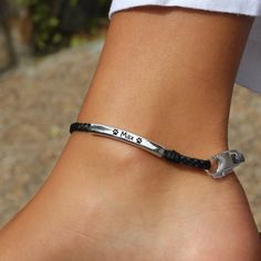 Show off your unique style with this ENGRAVABLE heirloom-worthy anklet! Engraving is a snap, and totally FREE! Crafted with a single braided, leather strand and silver plated crescents, this engravable ankle accessory is perfect for expressing yourself - with up to 16 characters (including symbols!), you can let your personality shine with every step. Engraving is FREE! maximum of 16 characters can be engraved, symbols count as 2 characters single braided leather strand silver plated engravable Ankle Accessories, Character Symbols, Expressing Yourself, Leather Anklets, Single Braid, Braided Leather, Custom Engraving, Anklets, Silver Plate