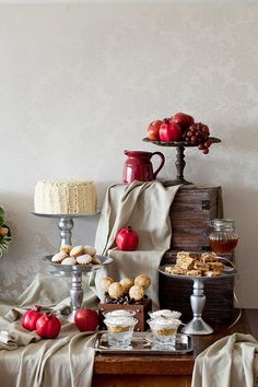 an assortment of desserts and pastries on a table