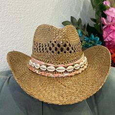 This coastal cowgirl hat has bright coral fabric with gold details and shells. A coastal cowgirls dream! All hats are around 22-24 inches inside but come with an adjustable string that can tighten the hat inside. Check out my Instagram @delisico *PLEASE MESSAGE ME IF YOU NEED FOR A SPECIFIC DATE. BIRTHDAY, CONCERT, EVENT* Adjustable Pink Bohemian Sun Hat, Adjustable Bohemian Pink Sun Hat, Gold Festival Hat Bands For Summer, Pink Western Straw Hat For Rodeo, Pink Western Sun Hat For Rodeo, Pink Western Style Sun Hat For Rodeo, Adjustable Pink Sun Hat For Country Events, Bohemian Pink Hat Band For Beach, Pink Western Wide Brim Straw Hat