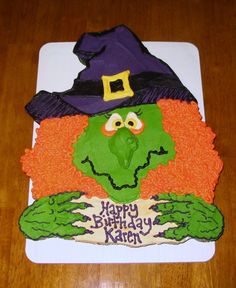 a cake decorated to look like a witch